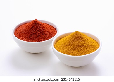 Red chilli Powder and Turmeric Powder isolated on white background  - Powered by Shutterstock