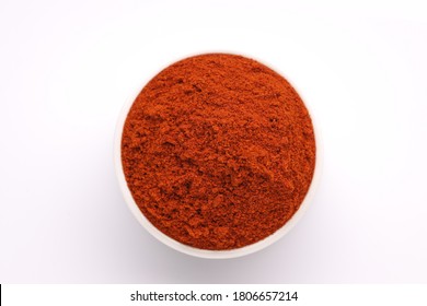 Red Chilly Powder ,Indian Spice;arranged In A White Bowl  With White Texture Or Background,top View