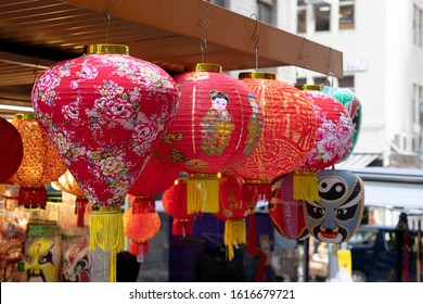 Red Chinese lanterns hanging at market - Powered by Shutterstock