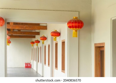 Red Chinese Lanterns Hanging On Wire Outdoor Lamps In Temple Of China Town Decoration On Chinese New Year Festival Culture Background In Asia.