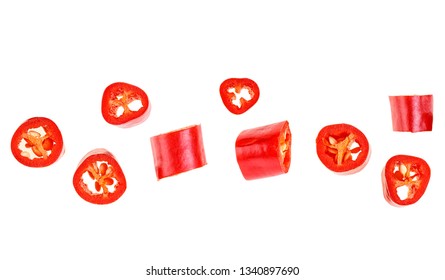 Red Chopped Chili Peppers On White Background. Top View.