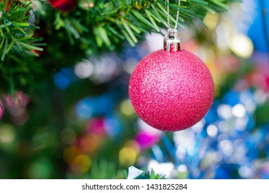 Red Chrismas Ball Hanging On Tree