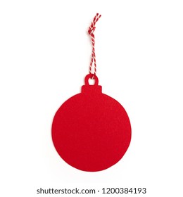 Red Christmas Ball Gift Tag With Ribbon Isolated On White Background