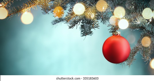 Red Christmas Ball Hanging On Christmas Tree.