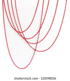 Red Christmas Bead Garland Hanging On White Background