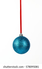 Red Christmas decor ball isolated on white background.