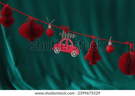 red christmas decor on green background