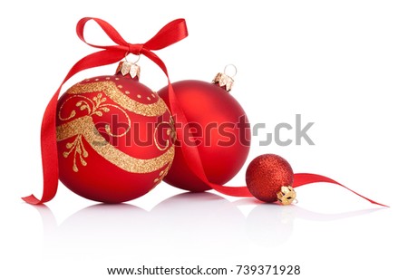 Red christmas decoration baubles with ribbon bow isolated on white background