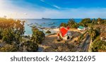 Red church at Cap Malheureux village, Mauritius Island. Notre Dame de Auxiliatrice, rural church with red roof in Cap Malheureux tropical village on Mauritius island, Indian Ocean.