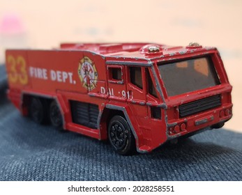 Red civil defence toy truck 