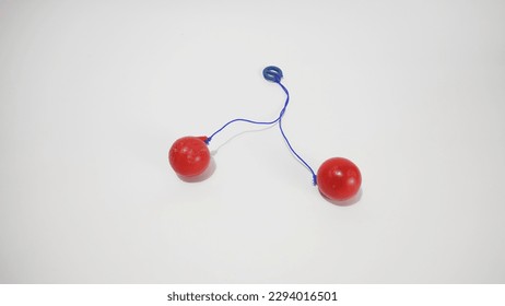 a red clacker ball, a popular toys from in 1990 - Powered by Shutterstock