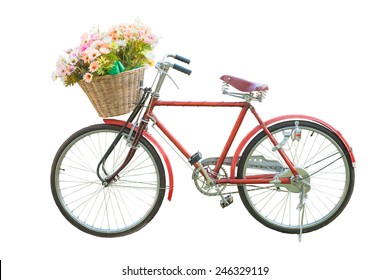 red classic bike with flower in basket isolate on white background