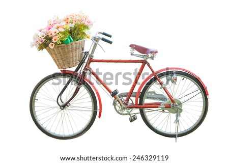 red classic bike with flower in basket isolate on white background