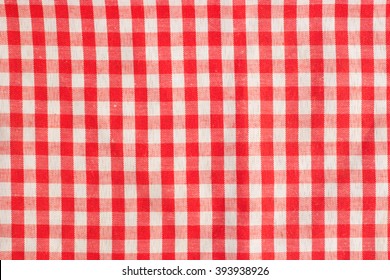 Red classic checkered tablecloth texture, background with copy space - Shutterstock ID 393938926