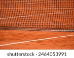 Red clay tennis court ready for match