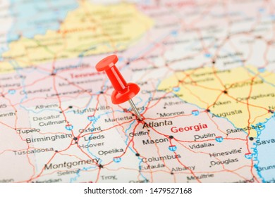 Red Clerical Needle On A Map Of USA, South Georgia U.S. State And The Capital Atlanta. Close Up Map Of South Georgia U.S. State With Red Tack