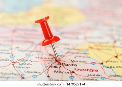 Red Clerical Needle On A Map Of USA, South Georgia U.S. State And The Capital Atlanta. Close Up Map Of South Georgia U.S. State With Red Tack