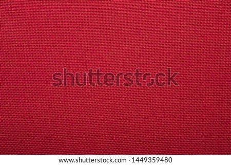 Red cloth or red fabric.