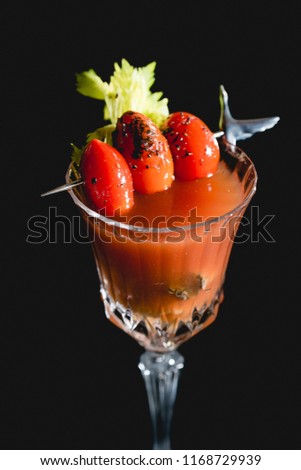 Red cocktail on dark background