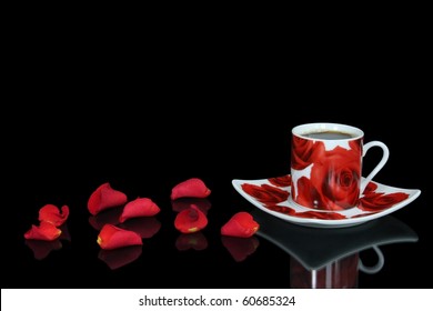 Red Coffee Cup With Rose Petals On The Black Background