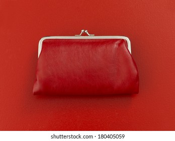 Red Coin Purse On Red Background