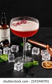 Red Coktail With Foam In High Glass On Black Background