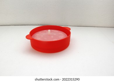 Red Collapsible Microwave Silicone Popcorn Bowl With Fresh Popcorn And Corn All Ready For Movie Watching
