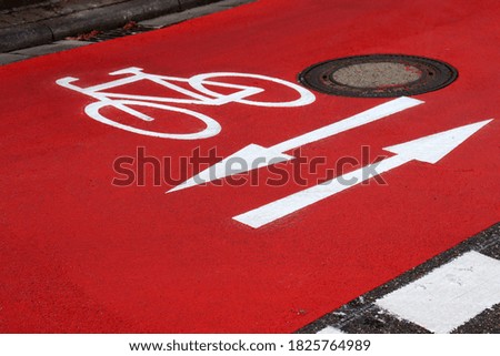 Similar – Foto Bild Fahrradweg, Verkehrswende, Fahrbahnmarkierung 4