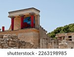 Red columns of a greek ruins of the King Minos palace in Knossos, Crete