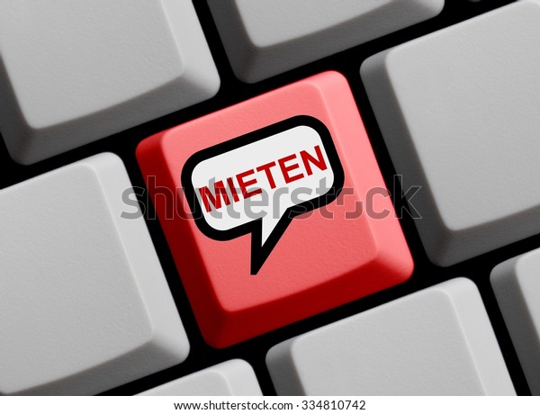 Red Computer Keyboard with speech bubble showing\
Rent in german language
