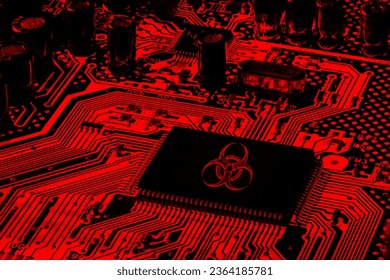 Red computer motherboard featuring a biohazard logo, depicting a concept of virus ransomware and spamware attack