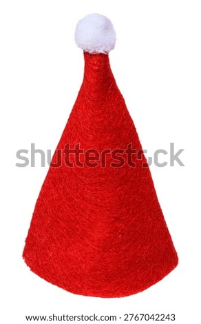 Red cone-shaped hat made of thick fleecy material with a white fluffy pompom on top, isolated background