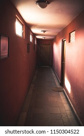 red corridor to a room