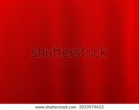 Red cotton fabric texture used as background. Empty red  fabric background of soft and smooth textile material. There is space for text..	