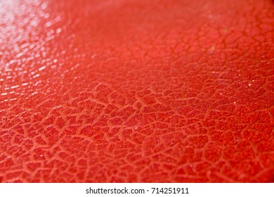 Red cracked texture background. Selective focus. - Shutterstock ID 714251911