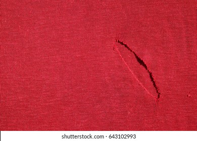 Red Crimson Fabric Cloth With Tear Texture Background