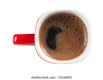 A red cup of coffee isolated over white background. Top view