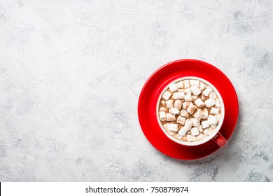 Red Cup Of Hot Chocolate Or Cocoa With A Marshmallow. View From Above With Copy Space.