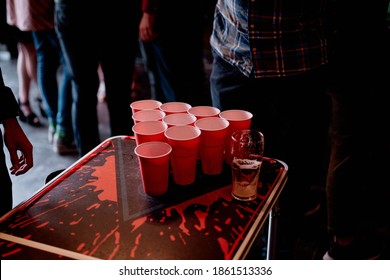 Red cups for beer pong game on table  - Powered by Shutterstock