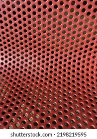 Red Curved Perforated Metal Sheet Close Up