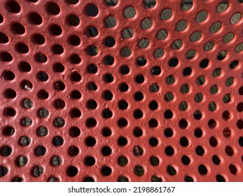 Red Curved Perforated Metal Sheet Close Up