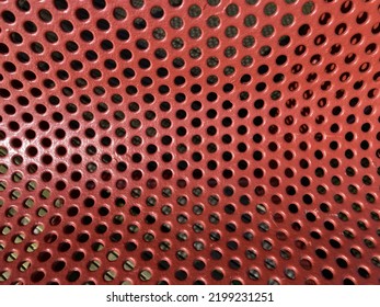 Red Curved Perforated Metal Sheet Close Up