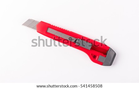   Red cutter knife isolated on white background.