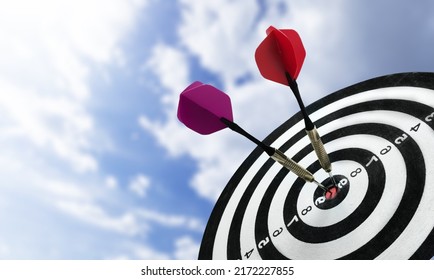 Red dart in center of target over sky background - Shutterstock ID 2172227855