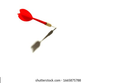 red dart sticking out of white space with shadow on a white background - Shutterstock ID 1665875788