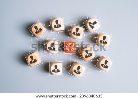 Red dartboard sign as a target connected with many business person or working staff. Target customer or Human resource, head hunter concept. [[stock_photo]] © 