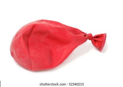 Red Deflated Balloon Isolated On A White Background