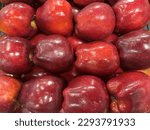 Red Delicious (a type of apple with a red exterior and sweet taste that was first recognized in Madison County, Iowa, in 1872)