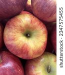 Red Delicious is a type of apple with a red exterior and sweet taste that was first recognized in Madison County, Iowa, in 1872. Today, the name Red Delicious comprises more than 50 cultivars.