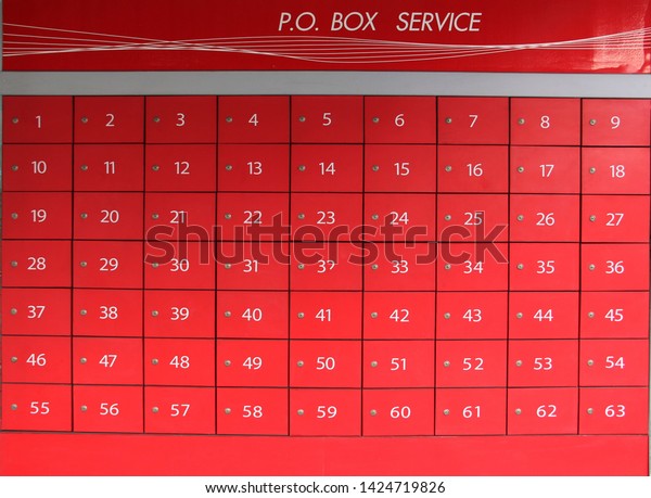 Red deposit box with number\
Divided into channels ,the post  Office (PO box service) red mail\
box.